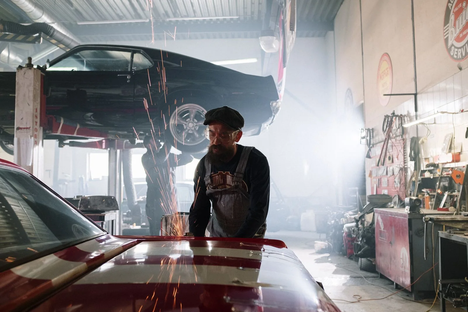 Classic performance car receiving careful shop work