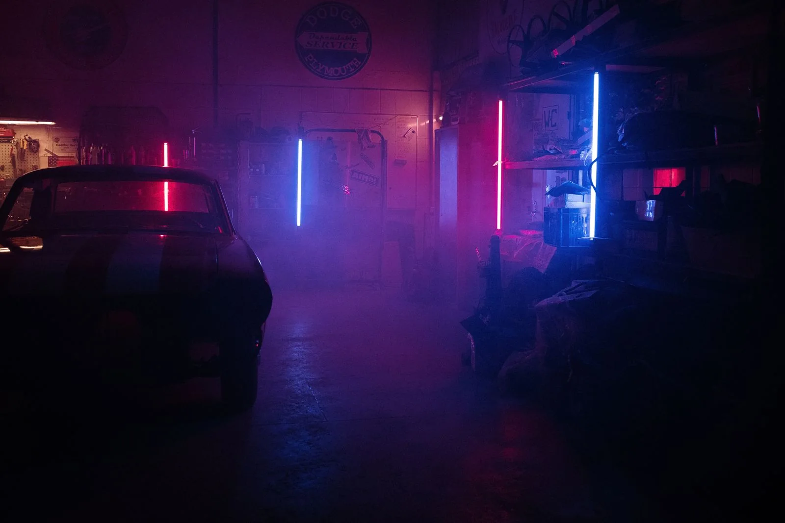 Performance vehicles in a dramatic custom garage